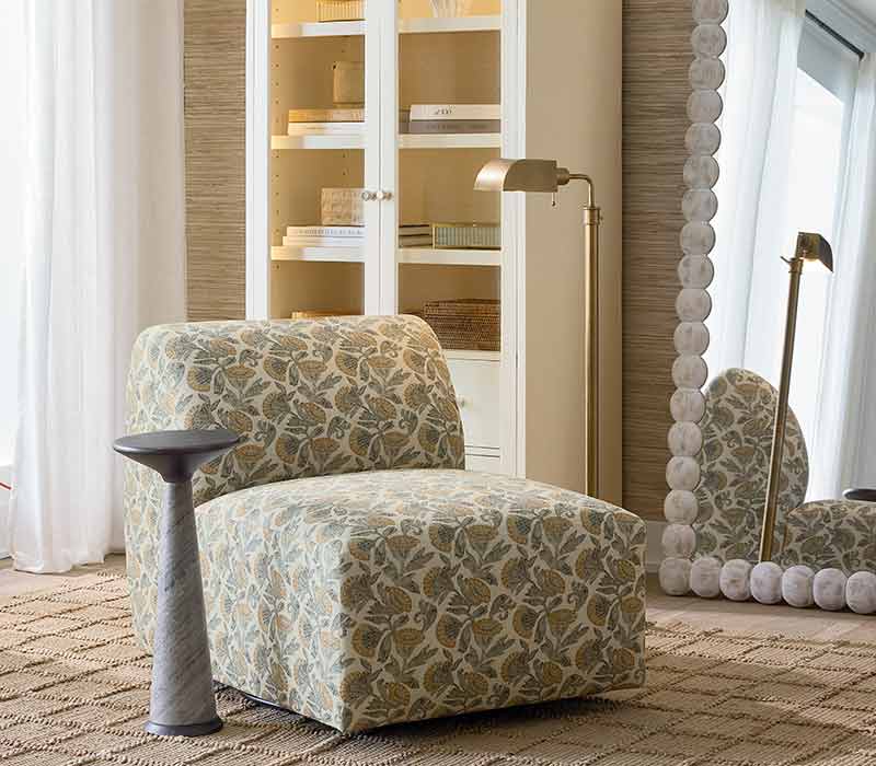 Accent chair in front of Christmas tree